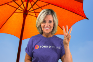 Image of Lisa Barry wearing new Sound of Life t-shirt